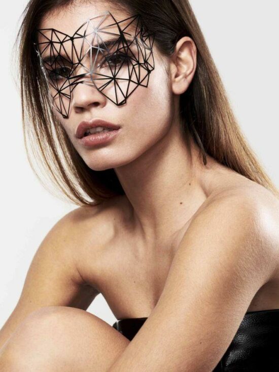 Eye Mask Kristine - أي ماسك كريستين Sleek black vinyl mask with reusable skin-friendly stickers, ideal for makeup and lingerie.
